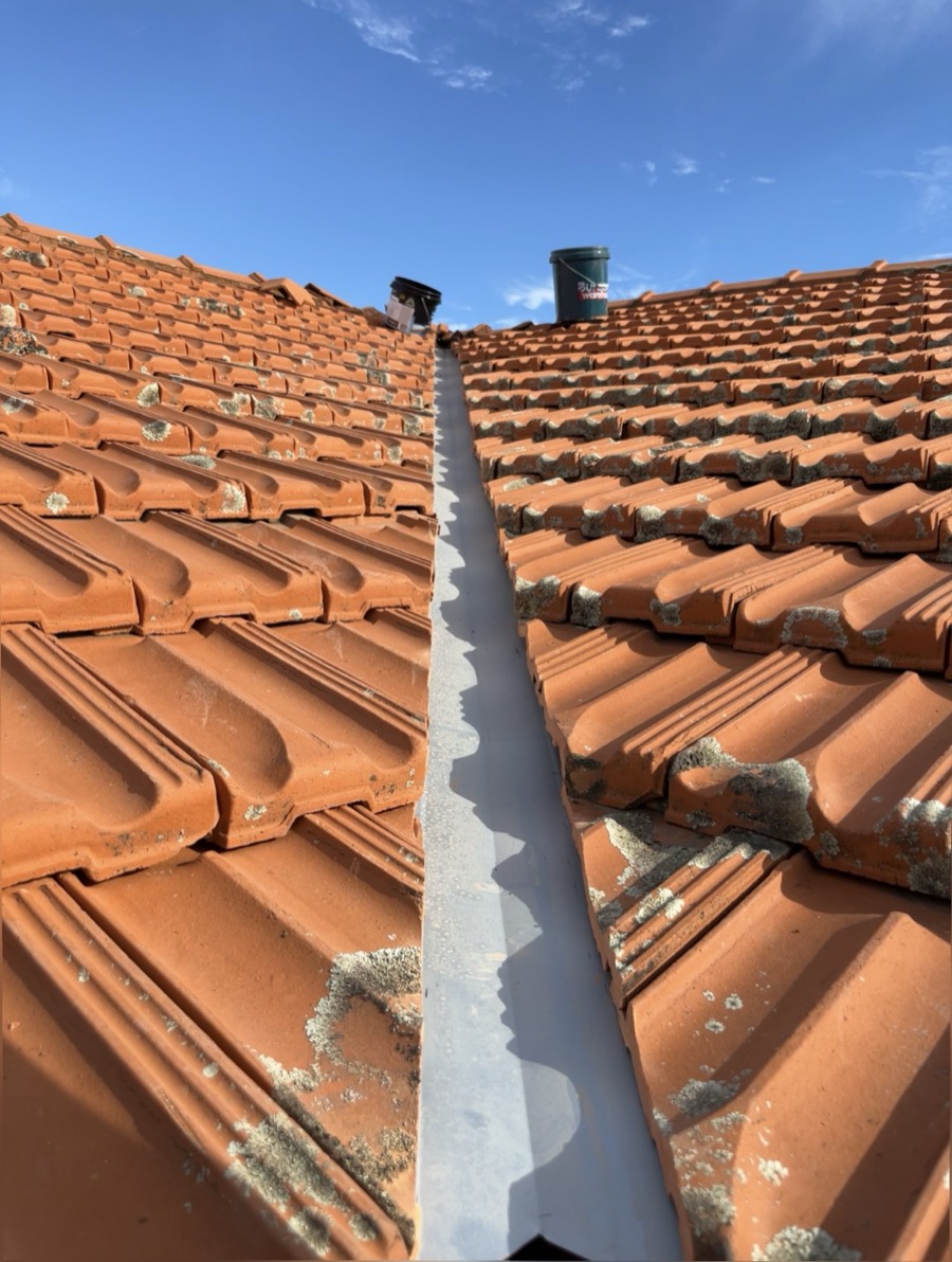 After: New valley iron with the tiles laid back neatly