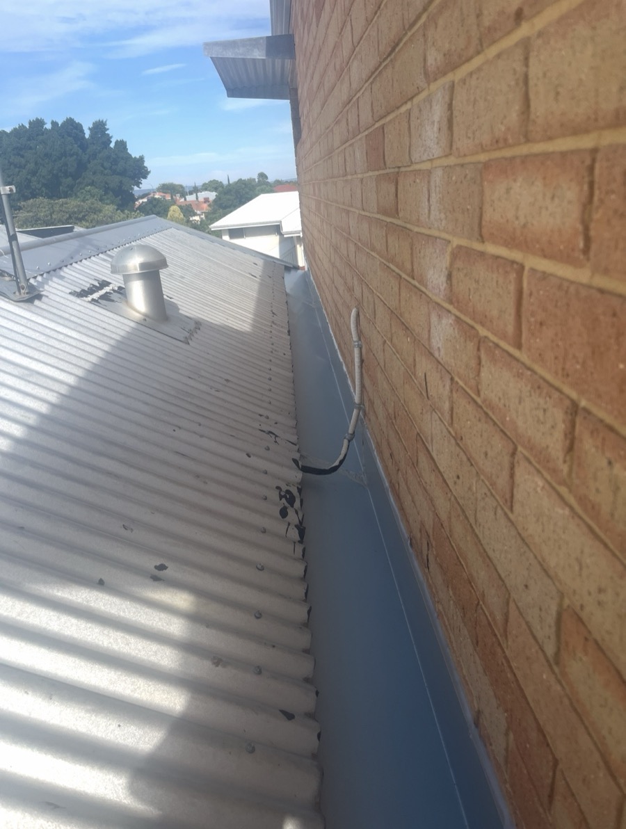 After: New box gutter and wall flashing