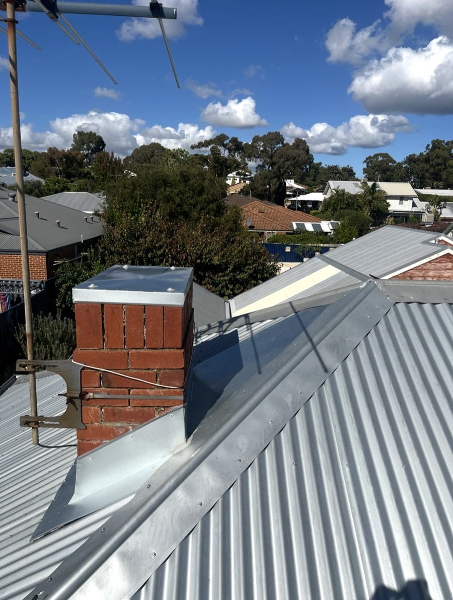 After: Chimney with new flashings and a metal cap