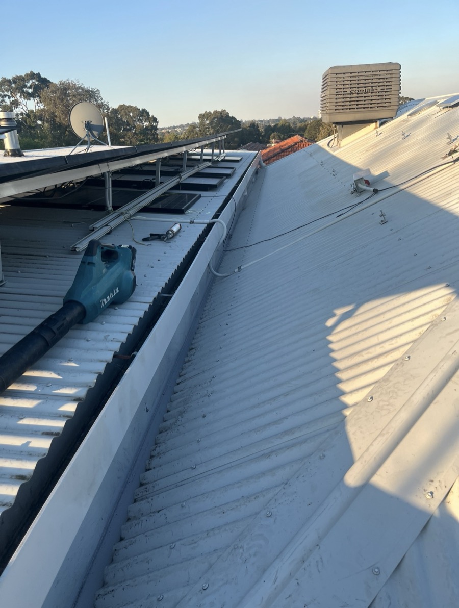 After: New box gutter with the roof sheets back in place