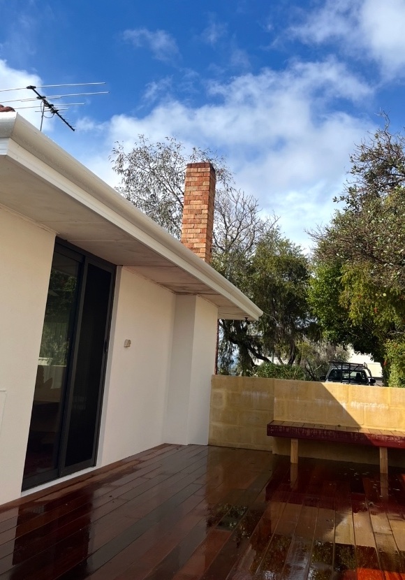 After: New fascia and gutter fitted along the same eave
