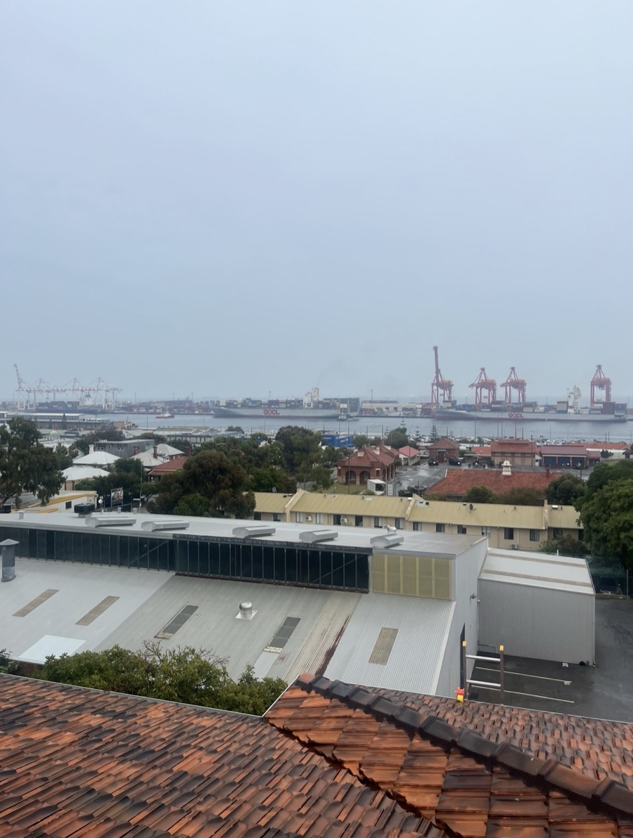 On a tiled roof overlooking Fremantle Port